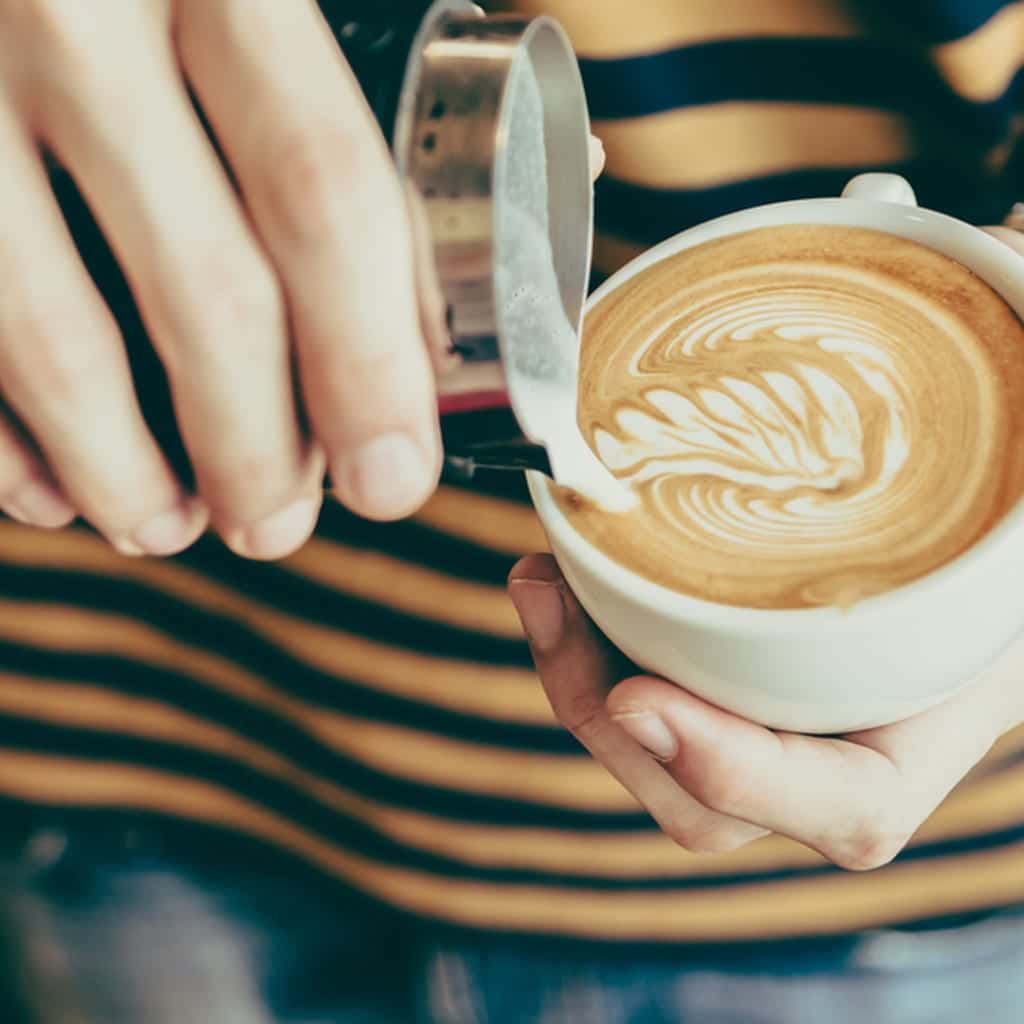 Tasse Kaffee mit Barista-Kunst