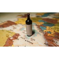 Wine tasting Munich – bottle on map of Europe