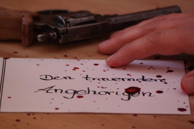 Krimidinner München – blutige Kondolenzkarte